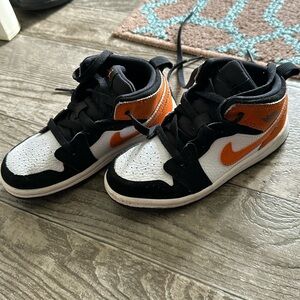 Toddler Jordan brand shoes. Style of shoe “air 1s” unisex.